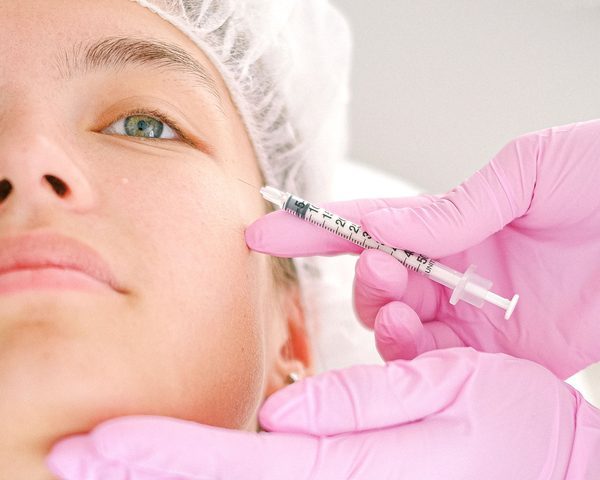 Skin revitalisation injection applied with a fine needle to the face — illustrative image